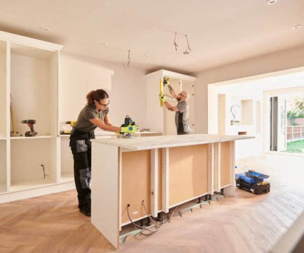 kitchen fitters installing some cabinets